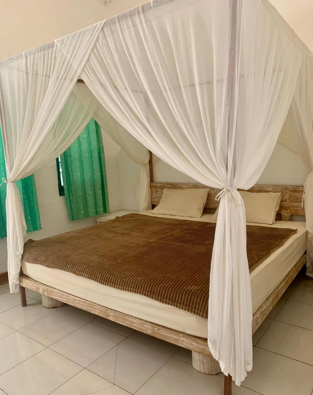 The Village Rua Beach Homestay Εξωτερικό φωτογραφία